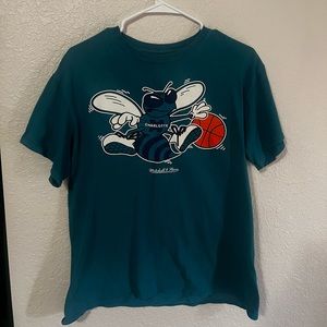 Mitchell and Ness charlotte hornets shirt.